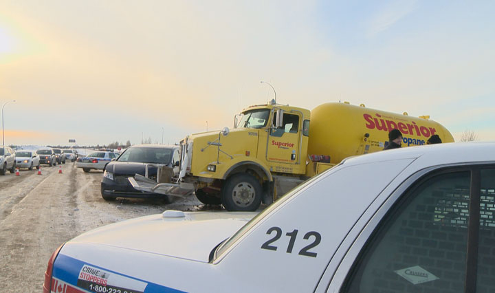Emergency services in Saskatoon deal with a collision involving a propane truck at the intersection of McOrmond Drive and Highway 5 Monday.