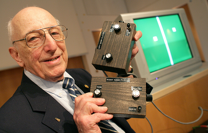In this July 2009 file picture , German-American game developer Ralph Baer shows the prototype of the first games console, invented by him during a press conference  at the Games Convention Online in Leipzig, Germany. 