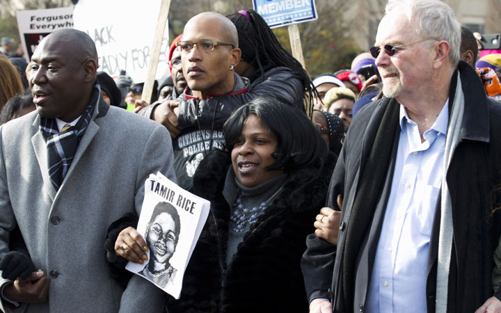 Samaria Rice, centre, the mother of Tamir Rice, the 12-year-old boy who was fatally shot by a police officer in Cleveland, and others, march in Pennsylvania Avenue toward Capitol Hill in Washington.
