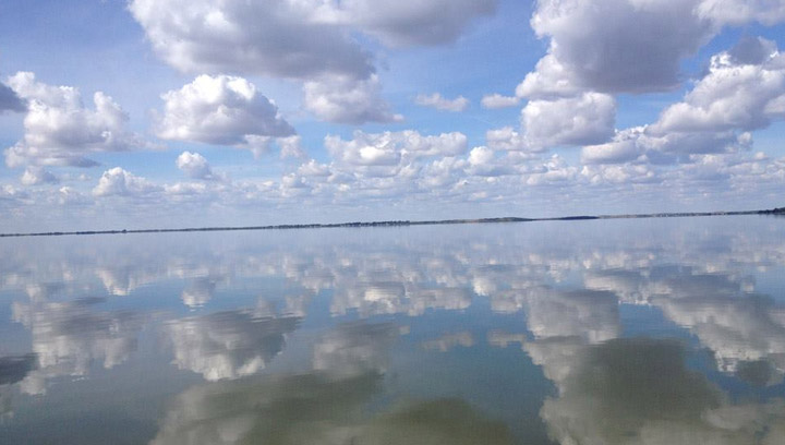 Sept 5: Heather Goddard took this photo at Jackfish Lake of clouds reflecting in the water.