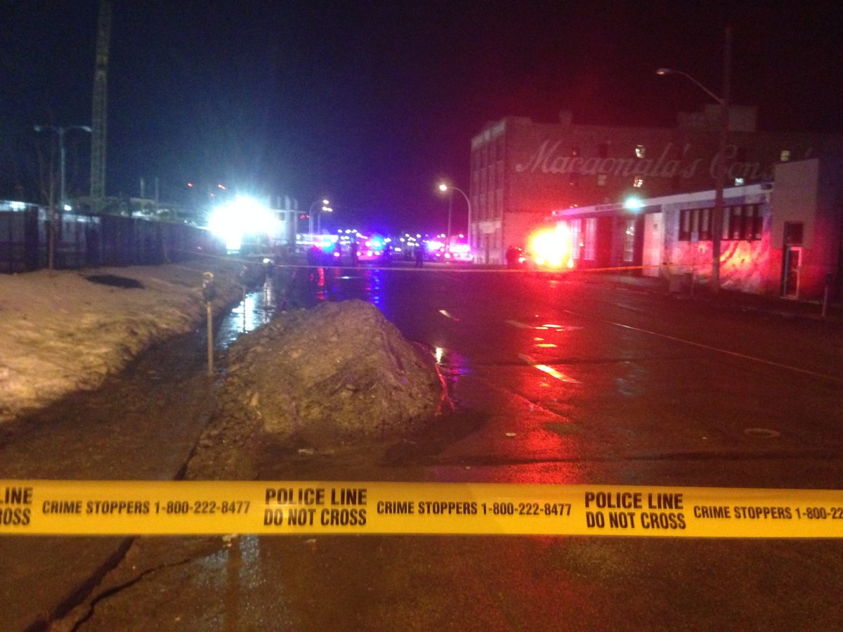 Edmonton Police blocked off a section of 105 Ave. following a serious shooting.  December 11, 2014. 