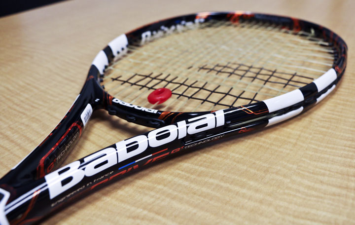 This Sunday, Nov. 30, 2014 photo shows the Babolat Play Pure Drive tennis racket, in Atlanta. The racket contains built-in sensors that measure the impact of the ball on the strings as well as the power and type of swing used by the player. The racket then transmits that information wirelessly to a companion app installed on a smartphone or tablet computer.