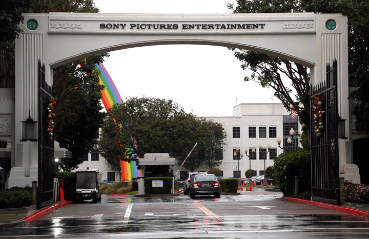 In this Dec. 2, 2014 file photo, cars enter Sony Pictures Entertainment headquarters in Culver City, Calif. Sony Pictures said the investigation into the cyberattack that crippled its computer systems is continuing and denies a report that it is poised to name North Korea as the culprit.