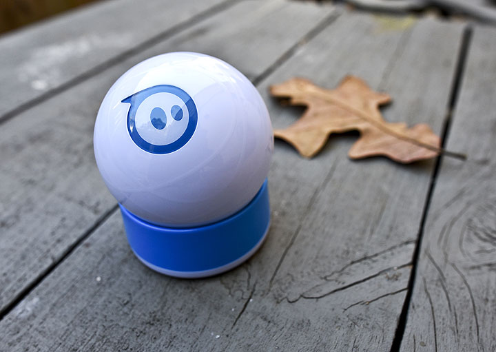 This Wednesday, Dec. 10, 2014 photo shows the Sphero robotic ball, in Decatur, Ga. The Sphero is controlled with an app on a smartphone and can roll, glow, spin, shake and dance, all under the direction of the user.
