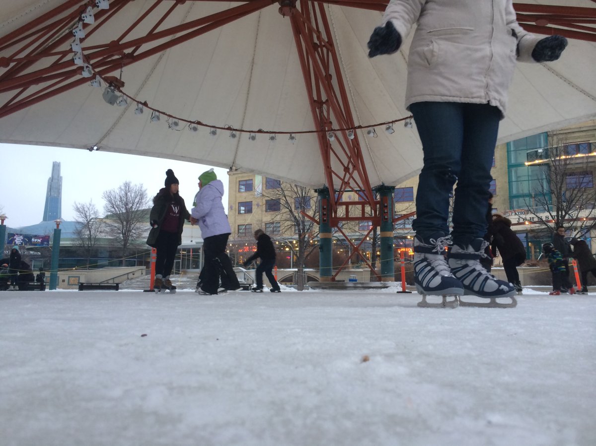 Skaters glide under the Forks canopy.