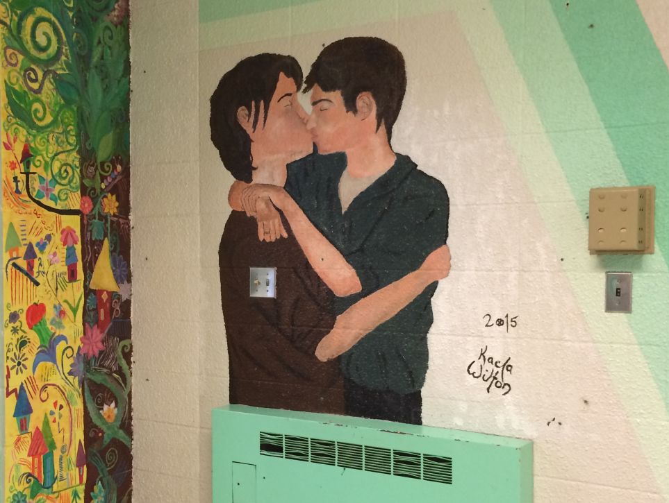 A painting on the wall of Onoway Junior-Senior High School depicting two young men kissing was covered up, then uncovered. Jan. 30, 2015.