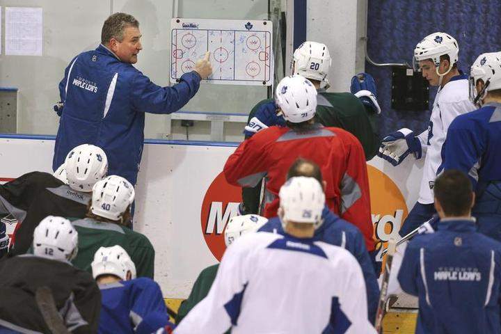 Coach Horachek talks to the troops. The Toronto Maple Leafs practiced today at the MasterCard Centre in Etobicoke. It was the first practice with their new coach, Peter Horachek. 