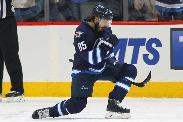 Mathieu Perreault will be in the Winnipeg Jets lineup Tuesday night after missing Monday's practice to help his wife deliver their child.