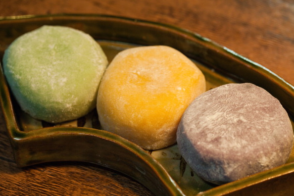 Mochi is a Japanese rice cake made of glutinous rice pounded into paste and then molded into shape.