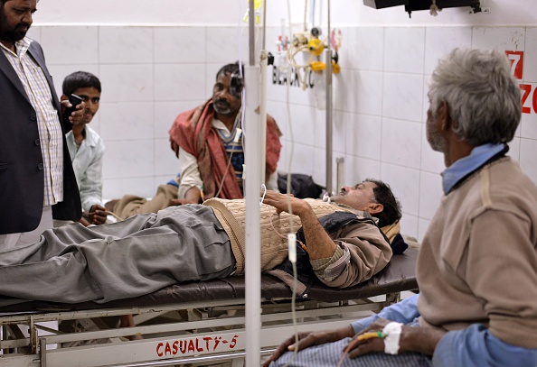 An alcohol poisoning patient receives treatment at the King George Medical College Hospital in Lucknow on January 12, 2015.