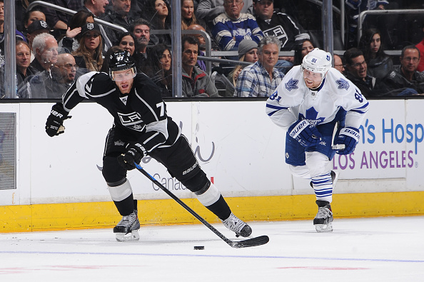  Jeff Carter #77 of the Los Angeles Kings handles the puck during a game against the Toronto Maple Leafs at STAPLES Center on January 12, 2015 in Los Angeles, California.