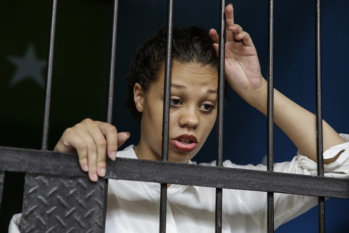 Heather Mack of the US waits in a cell before her first hearing trial on January 14, 2015 in Denpasar, Bali, Indonesia. Heather Mack and her boyfriend Tommy Schaefer are accused of murdering Mack's mother, Sheila von Wiese-Mack, whose body was found stuffed inside a suitcase in the back of a taxi outside a luxury Bali hotel in August 2014. 