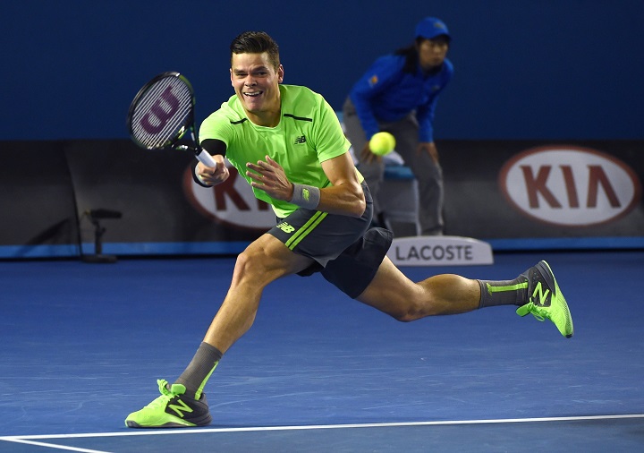 Canada's Milos Raonic hits a return against Serbia's Novak Djokovic during their men's singles match on day ten of the 2015 Australian Open tennis tournament in Melbourne on January 28, 2015. 