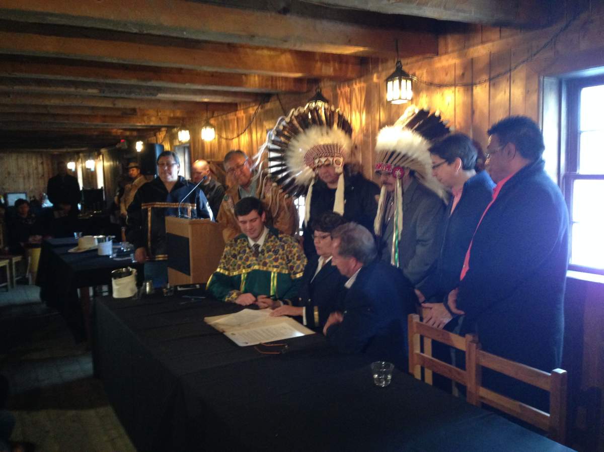 The Chiefs of Alberta Treaty Six First Nations and the Fort Edmonton Management Company sign a memorandum to work together to present stories from communities of the territory, Thursday, Jan. 29, 2015. 
