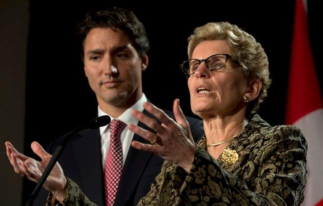 Liberal Leader Justin Trudeau and Ontario Premier Kathleen Wynne take part in a joint news conference in Ottawa Thursday January 29, 2015.