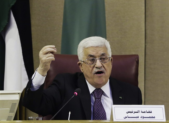 Palestinian President Mahmoud Abbas speaks during an Arab foreign ministers meeting at the Arab League headquarters in Cairo, Egypt, Thursday, Jan. 15, 2015.