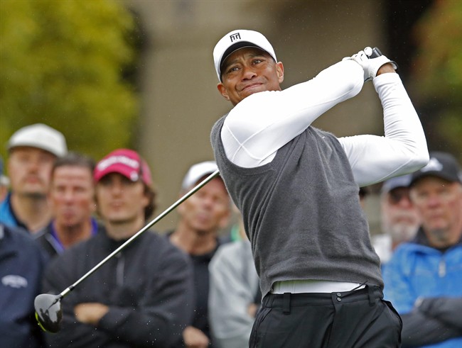 Tigers Woods tees off on the fifth hole during the second round of the Phoenix Open golf tournament, Friday, Jan. 30, 2015, in Scottsdale, Ariz.