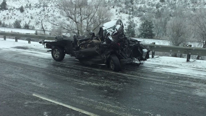 Man walks away from crash after being pancaked between trucks - image