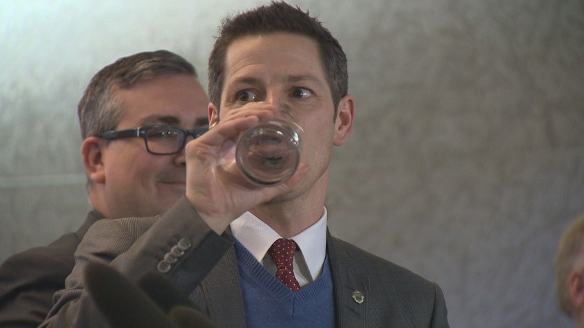 Winnipeg Mayor Brian Bowman drinks a glass of tap water after a boil water advisory was lifted in January, months after he was elected.