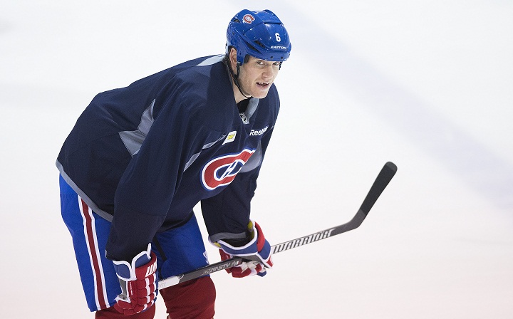 Montreal Canadiens' Bryan Allen warms up during a practise session in Brossard, Que., near Montreal, Wednesday, November 26, 2014. 