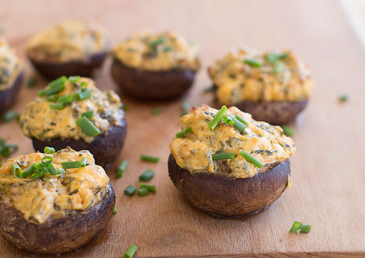 This Dec. 15, 2014 photo shows Buffalo chicken and kale stuffed mushrooms in Concord, N.H. This dish takes the flavors of a Buffalo wing and stuffs them into a mushroom cap and then is baked making for a great healthy tailgating snack.