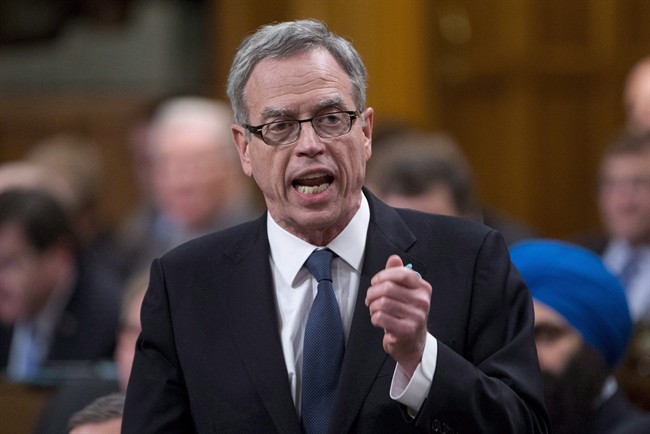 Finance Minister Joe Oliver responds during question period in the House of Commons on Parliament Hill in Ottawa on December 10, 2014. 