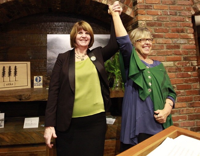 Former CBC host Jo-Ann Roberts poses with Green Party party leader Elizabeth May in Victoria on Saturday Jan. 24, 2014. Roberts announced Saturday she is seeking the Green Party's nomination in Victoria for this year's federal election. 