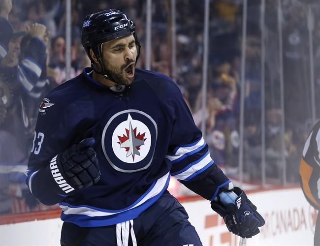 Winnipeg Jets' Dustin Byfuglien celebrates his goal against the Toronto Maple Leafs during a game this season.