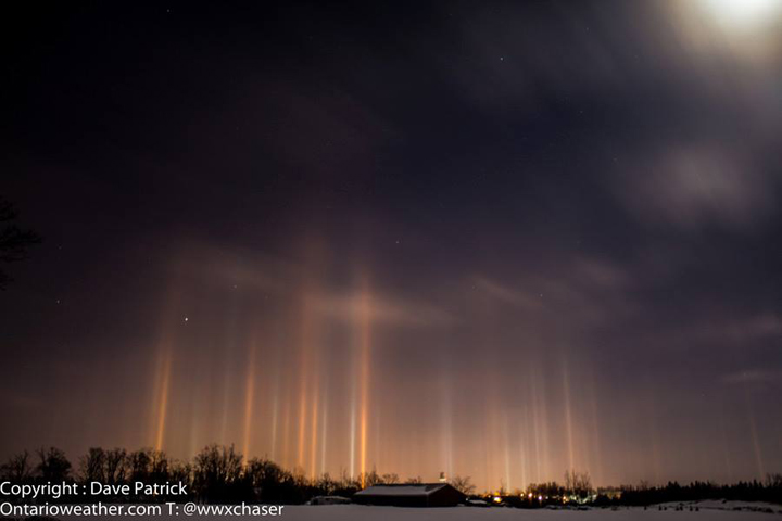Light pillars stretch into the sky in southwestern Ontario.