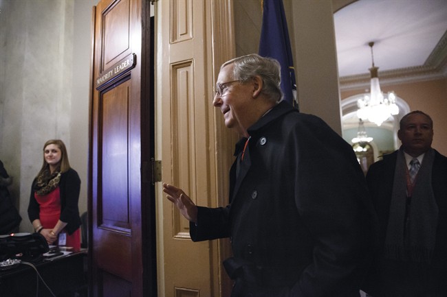 Senate Majority Leader Mitch McConnell of Ky. arrives for work on Capitol Hill in Washington, Monday, Jan. 12, 2015, as the Republican-controlled Senate is moving ahead on a bill to construct the Keystone XL pipeline despite President Barack Obama's veto threat. The House approved the bill last Friday.
