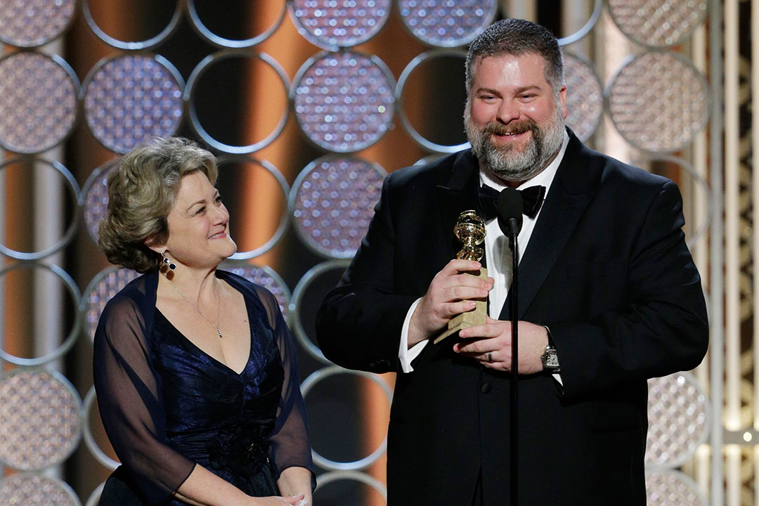 Producer Bonnie Arnold and Canadian director Dean DeBlois accept the Golden Globe for Best Animated Feature (‘How to Train Your Dragon 2’).