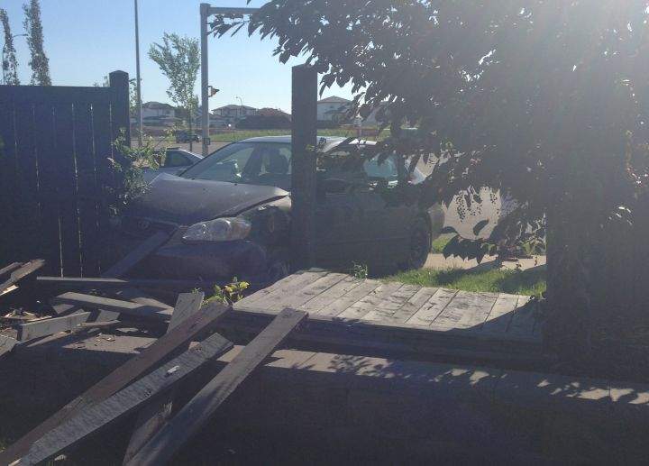 The Baratas’ fence crashed through in July 2013.