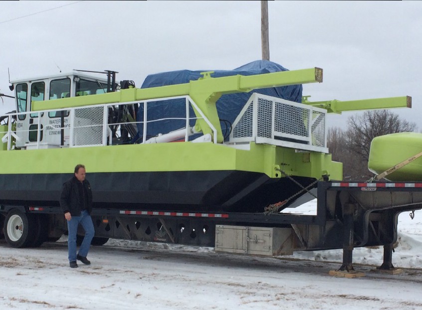Darrell Kupchik checks out an Amphibex ice breaking machine, soon to hit the Red River.