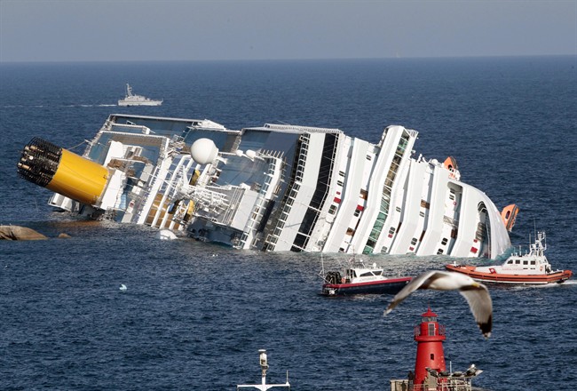  In this file photo taken on Jan. 14, 2012, the luxury cruise ship Costa Concordia lays on its side after running aground the tiny Tuscan island of Giglio, Italy.