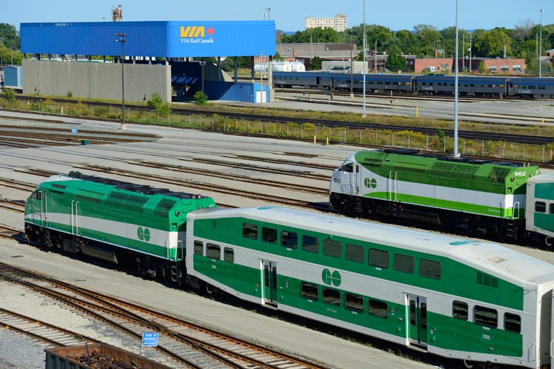 Two GO Trains sit at the maintenance facility shared with VIA Rail in Toronto, Ont., Sept. 7, 2014. 