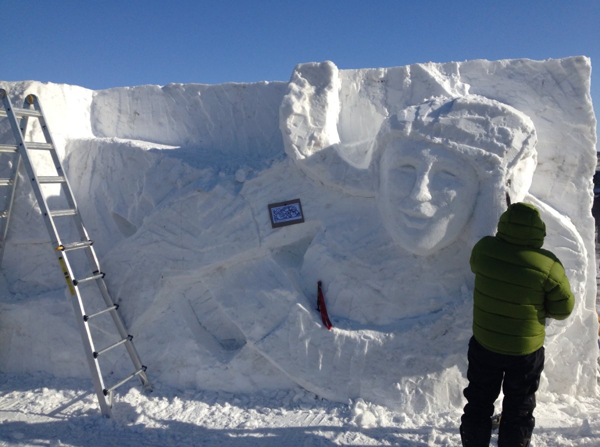Dave Mattocks works on a snow sculpture for Festival du Voyageur for last year's event.