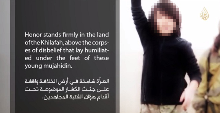 The boy seen in the purported execution video, shows little emotion as kills the two alleged spies but appears proud after shooting the men.