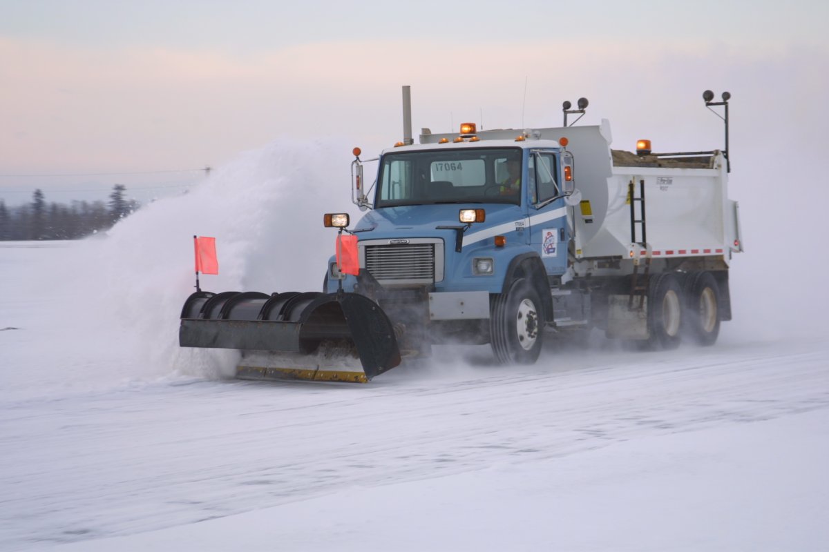 Snowplow on an Alberta highway.