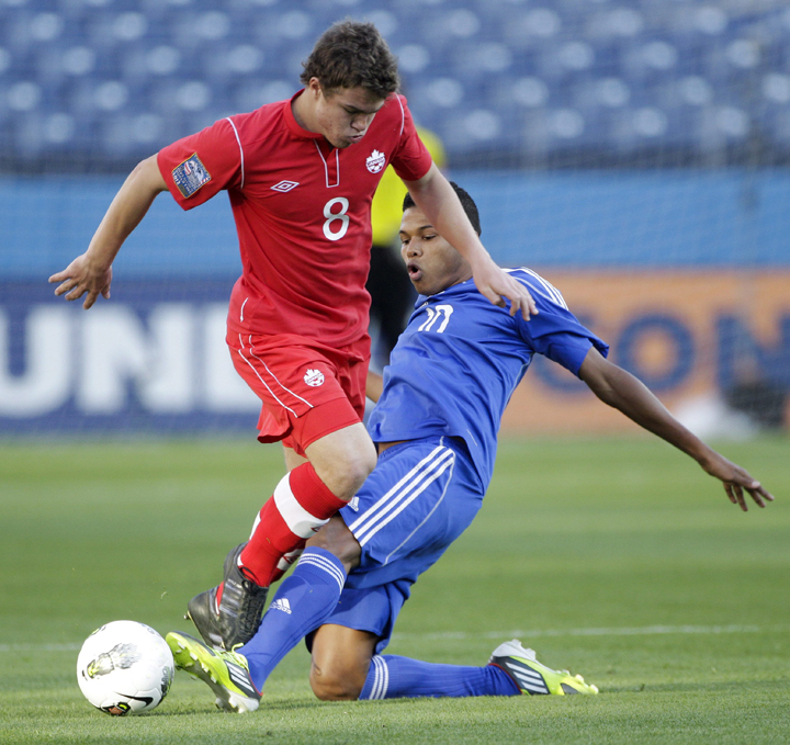 Canada’s Samuel Piette (8) collides with Cuba’s Maikel Chang (10) in the first half of a CONCACAF Olympic qualifying soccer match Monday, March 26, 2012, in Nashville, Tenn.