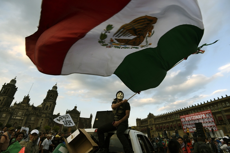 Students take part in one of several marches commemorating four months of the disappearance of 43 students from Ayotzinapa, on January 26, 2015, in Mexico City. 