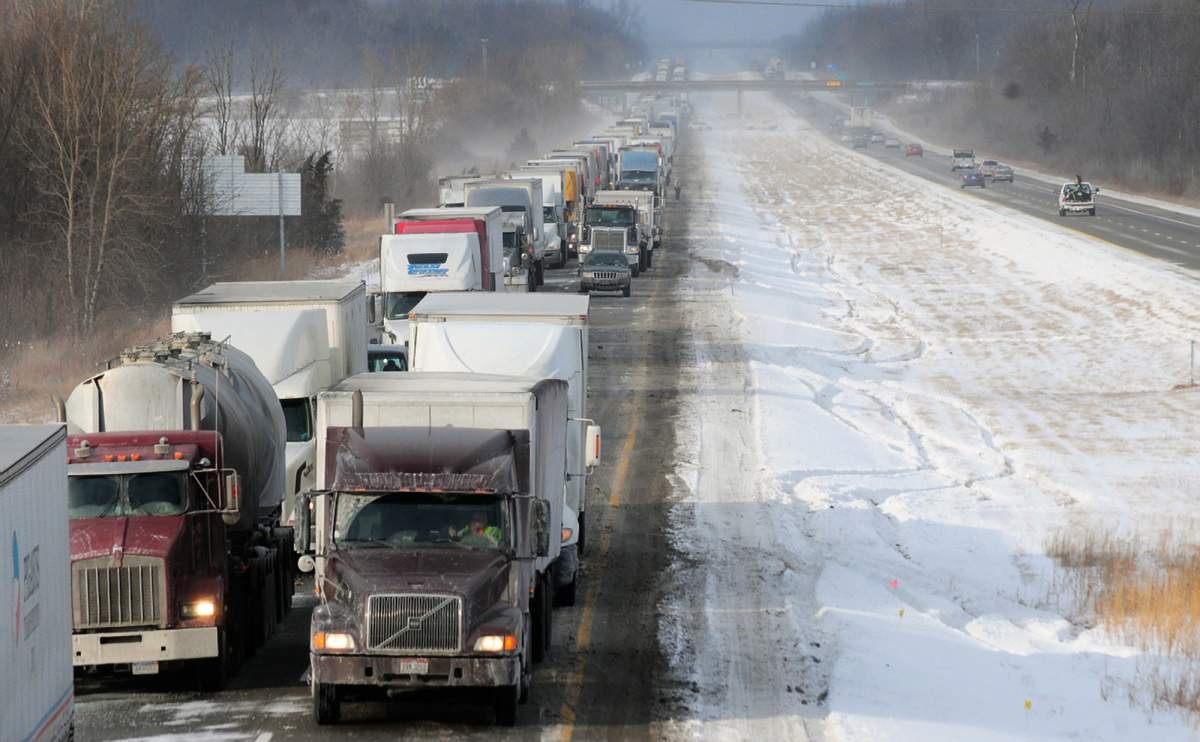 Traffic is delayed on U.S. 23 after a massive pile up in York Township, Mich. Friday, Jan. 9, 2015.