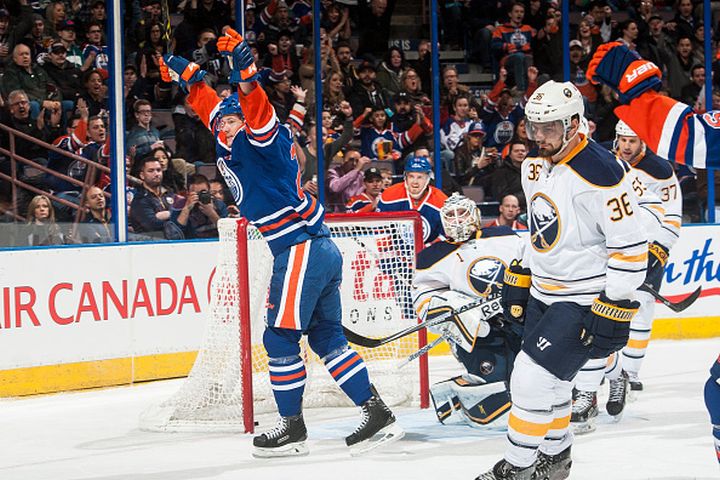 Matt Fraser #28 of the Edmonton Oilers celebrates after scoring a goal on Jhonas Enroth #1 of the Buffalo Sabres on January 29, 2015 at Rexall Place in Edmonton, Alberta, Canada. 