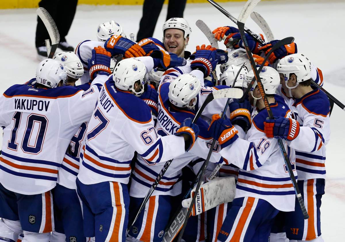 The Edmonton Oilers celebrate after winning an NHL hockey game against the Washington Capitals, Tuesday, Jan. 20, 2015, in Washington. Edmonton won 5-4 in a shootout.