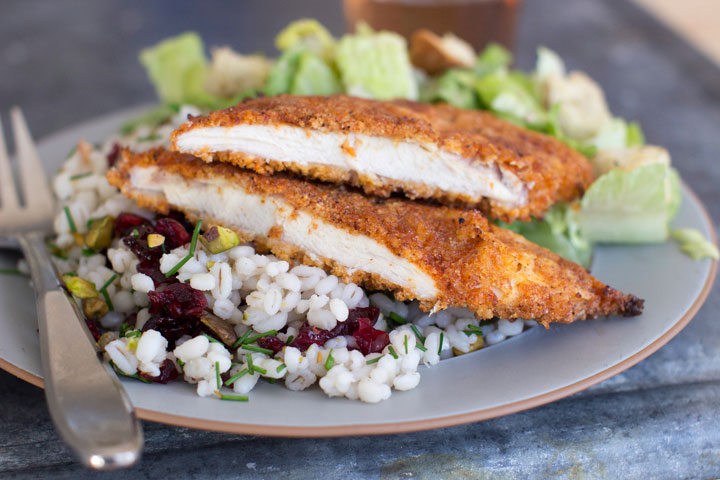 This Jan. 5, 2015, photo shows sweet-and-spicy panko-crusted chicken in Concord, N.H. While the breaded cutlets can be pan-fried, you can also use the ease of the oven.