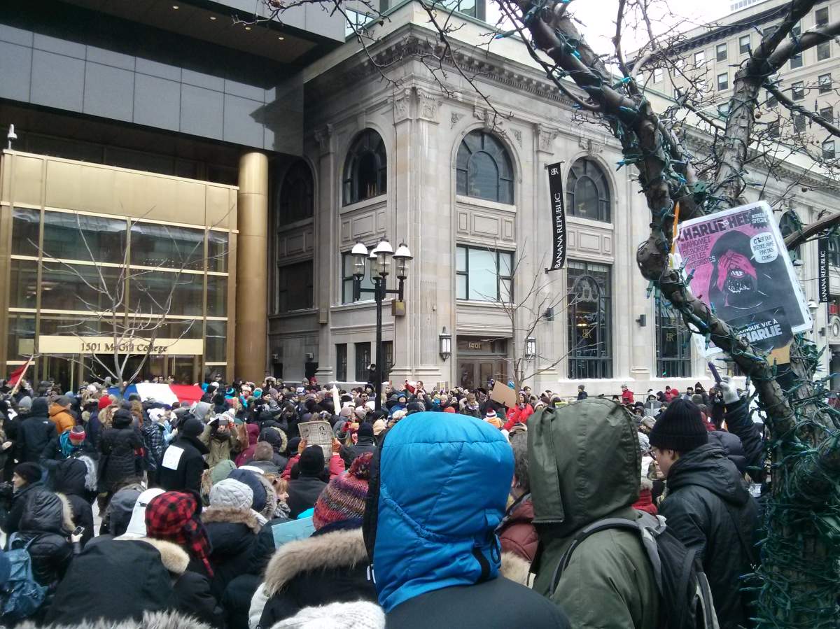 Montrealers sing La Marseillaise.