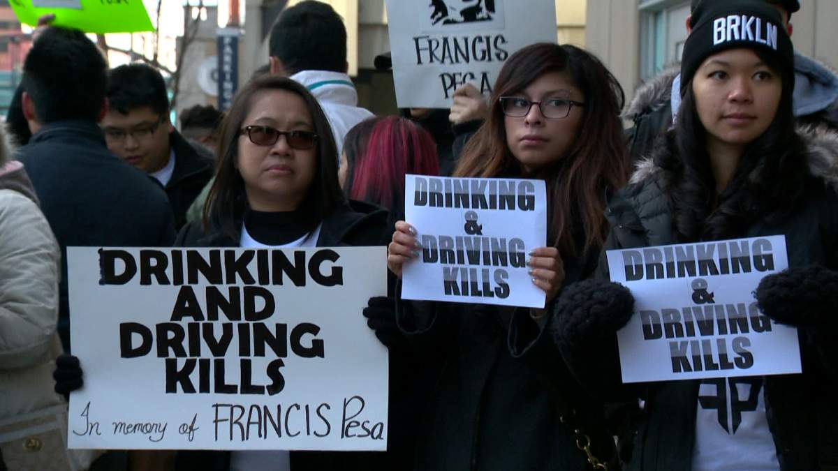 Protests at sentencing hearing for man charged with deadly crash - image