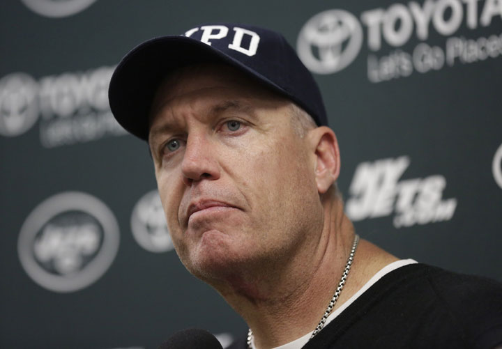 In a Sunday, Dec. 28, 2014 file photo, Rex Ryan listens to a questions during a news conference. 