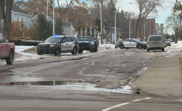 A heavy police presence in the area of 118 Avenue and 66 Street following liquor store robbery Sunday, Jan. 25, 2015.