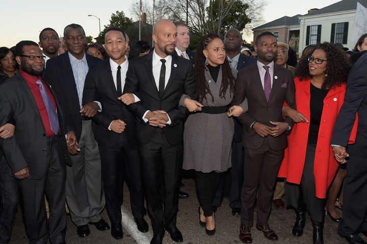John Legend, Common, Ava DuVernay, David Oyelowo, and Oprah Winfrey attend a commemorative march in Selma on Jan. 18, 2015.