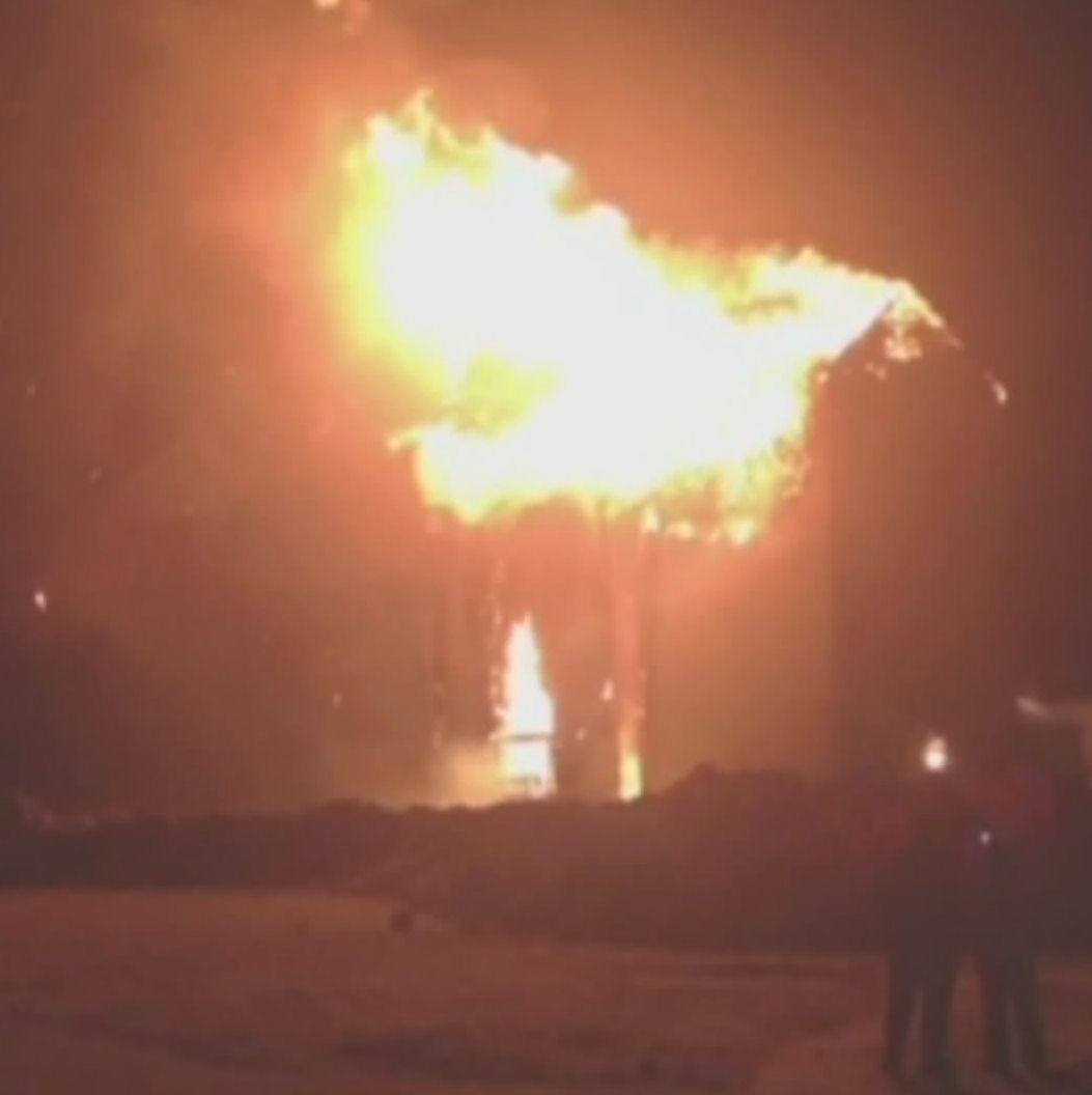 A grain elevator is destroyed by fire in Sexsmith, Alberta, Tuesday, Jan. 13, 2014. 